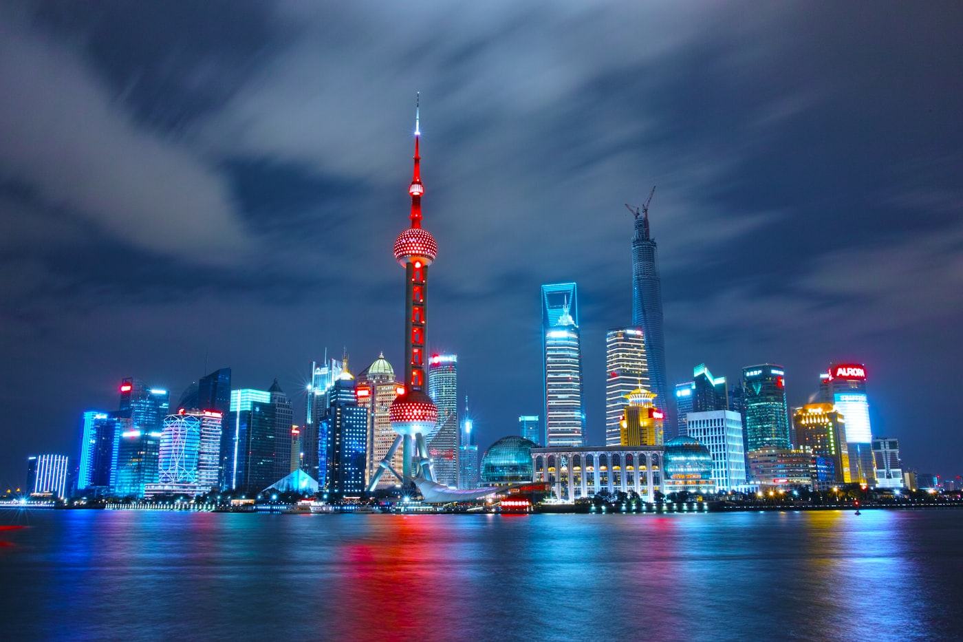 Shanghai skyline at night representing China's manufacturing economy