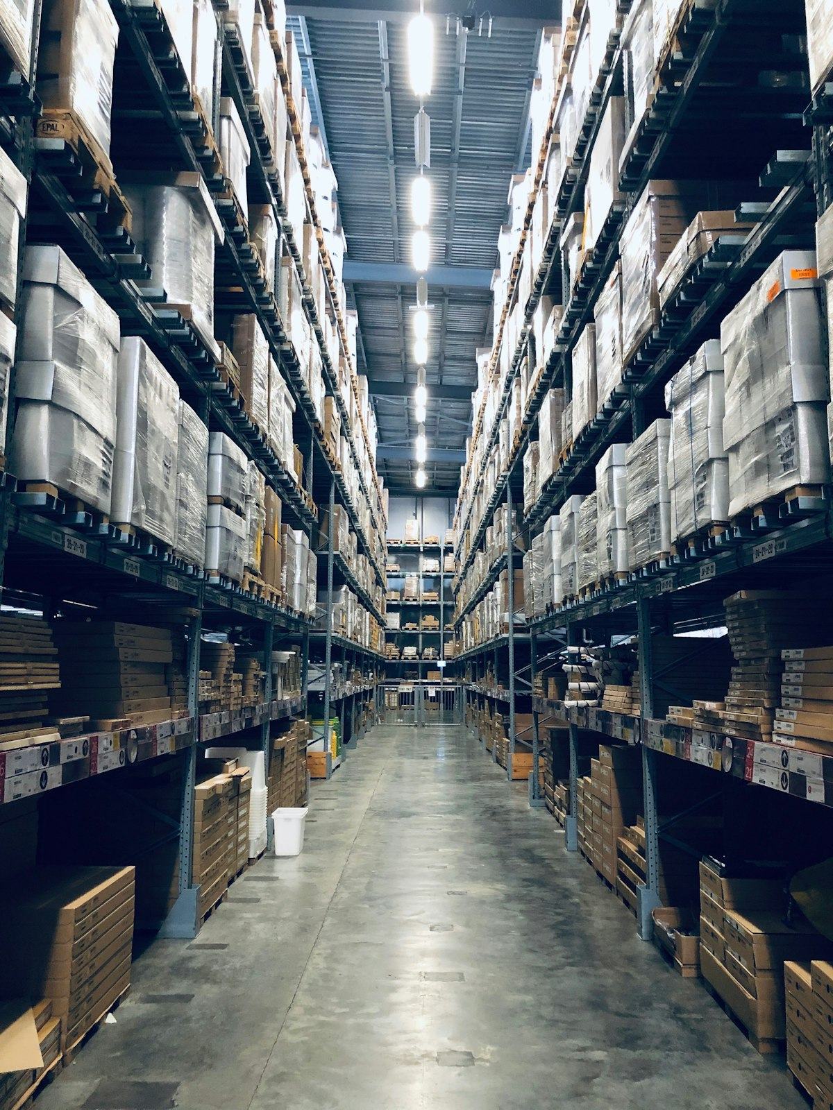 Warehouse aisle with organised inventory